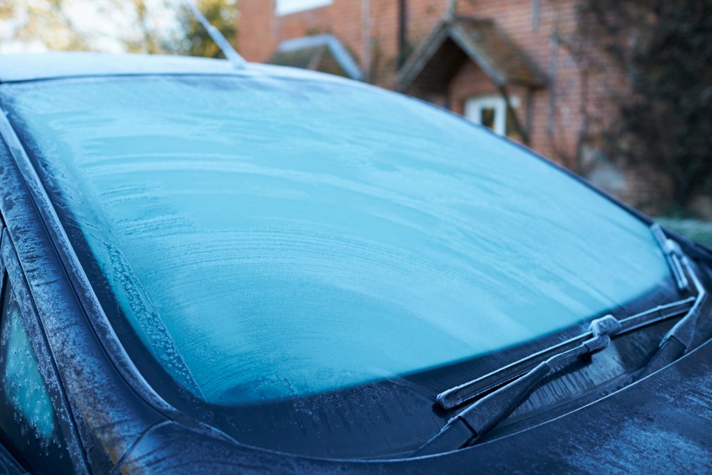 Winter Morning With Ice On Car Windshield
